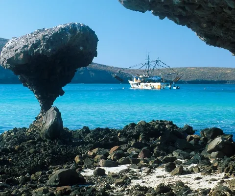 The Balandra Mushroom overlooking the blue water of the bay
